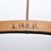 WOODEN CLOTHES HANGER W.SS