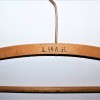 WOODEN CLOTHES HANGER W.SS